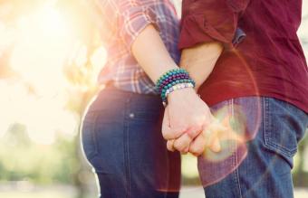 Young couple holding hands