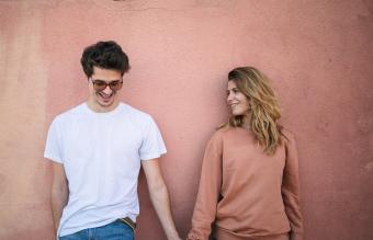 teenage couple smiling