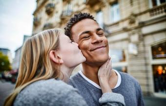 woman kissing boyfriend 