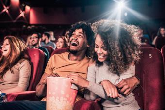 Couple in love hugging at cinema