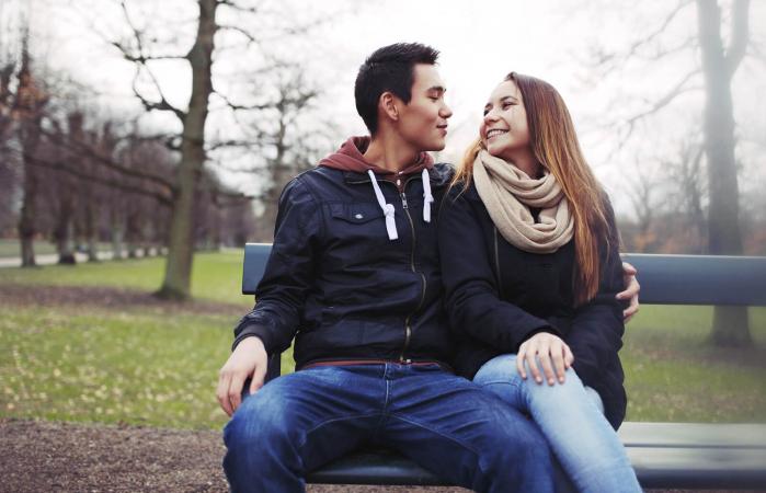 Teenage couple enjoying each other
