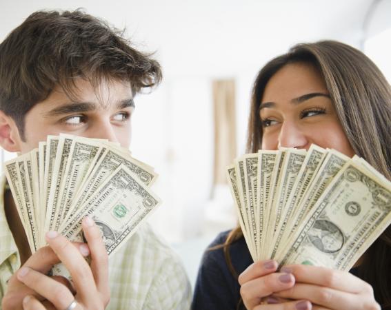 couple holding bills