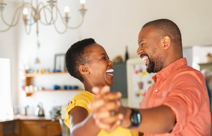 couple dancing at home