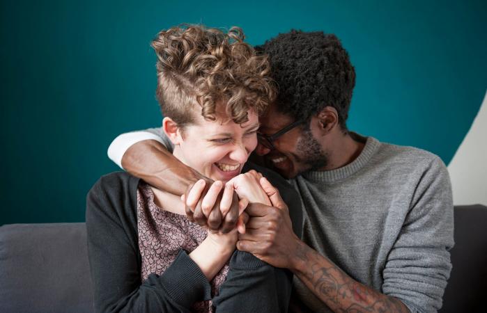 Couple laughing playfully