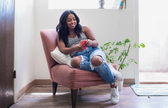 woman looking at her phone