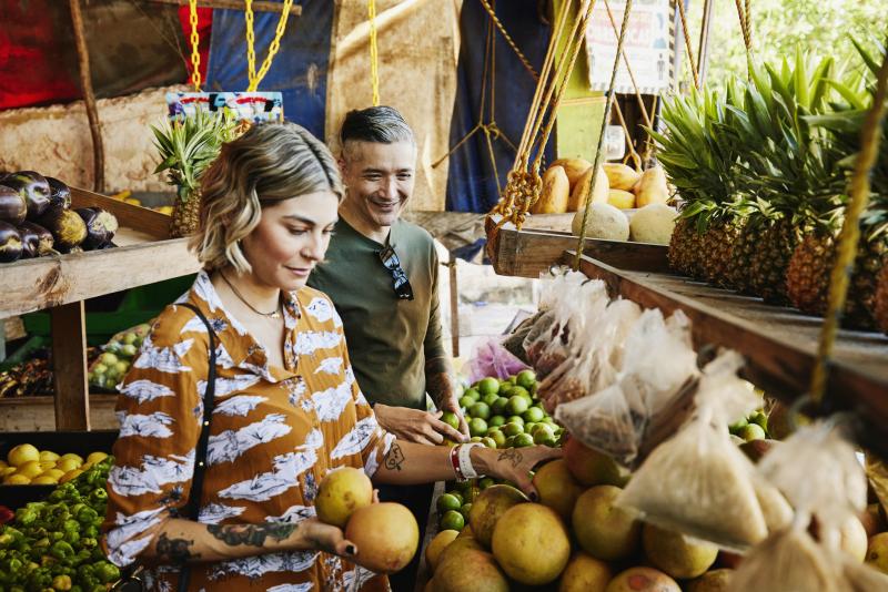 Couple shopping at market