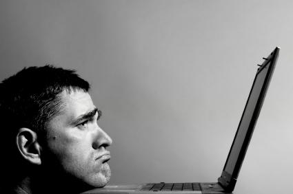 Sad Man at Computer