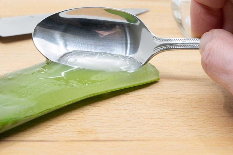 scrape aloe sap gel with spoon