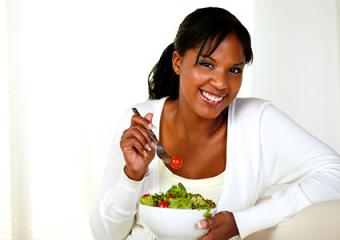 woman eating salad