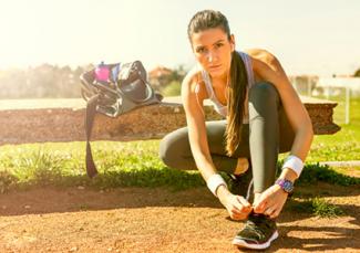 Woman athlete preparing to run