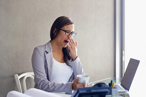 businesswoman yawning