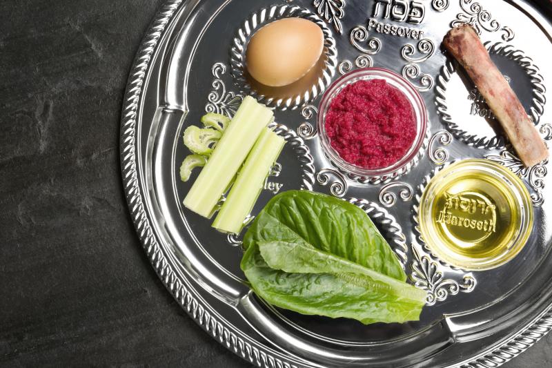 Passover Seder plate on black table