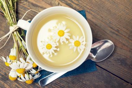 Chamomile Tea With Daisies In Cup