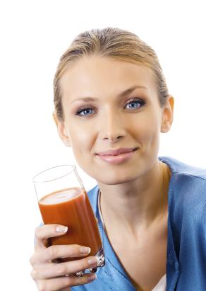 Woman Drinking Tomato Juice