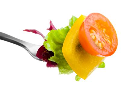 Fork filled with healthy foods