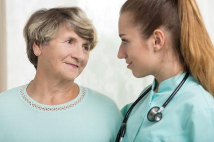 Doctor comforting her patient; © Katarzyna Bialasiewicz | Dreamstime.com