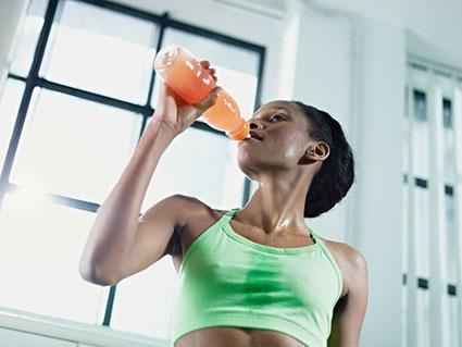 Woman drinking sports drink