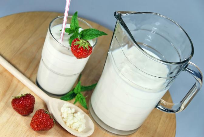 Jug and glass of kefir