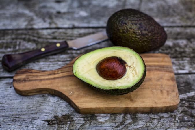 Avocado on chopping board