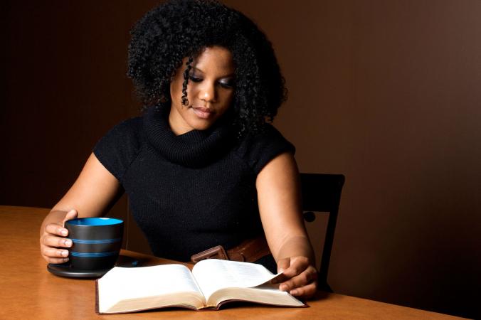Young Woman Reading Bible