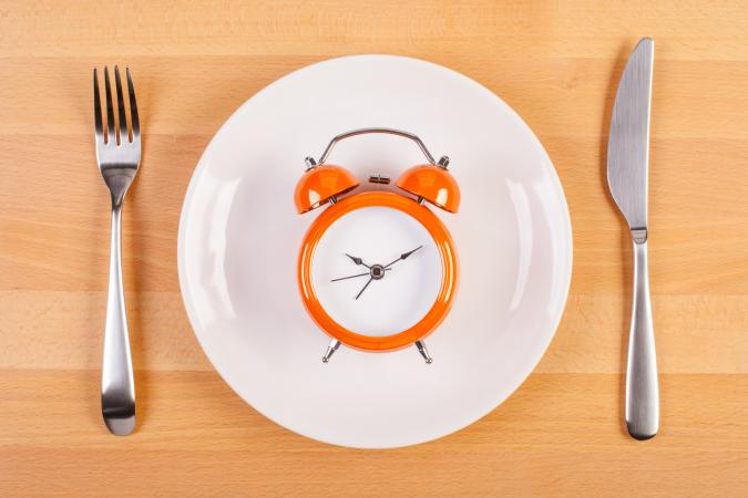 Weight loss diet concept with clock