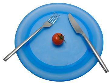 plate with one tomato