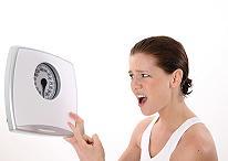 Woman with a scale.