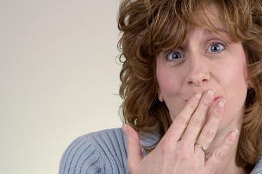Woman Embarrassed by Flatulence