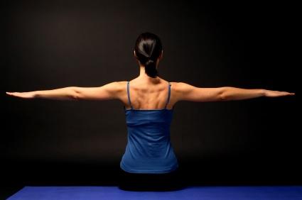Woman with muscular arms and back