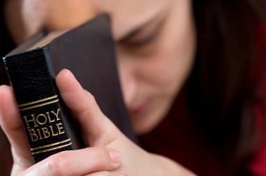 Woman Holding Bible