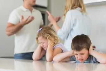 Parents arguing in front of children