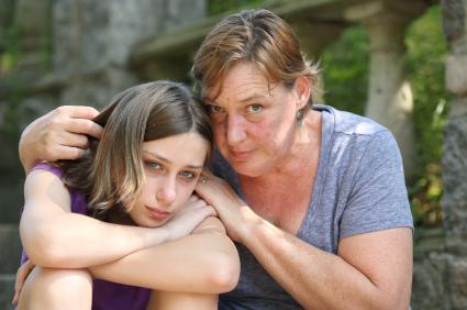 Worried mother and child
