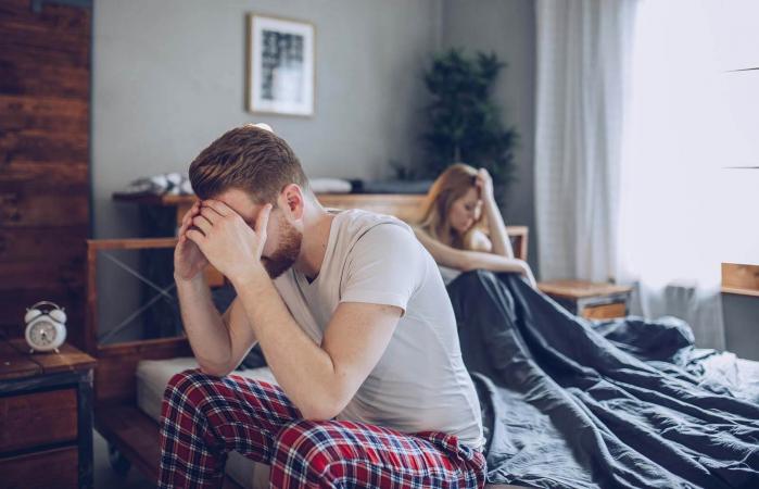 Couple having arguments in bed