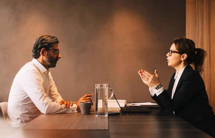 female lawyer talking with client