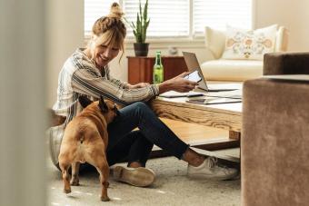 Woman and dog in living room