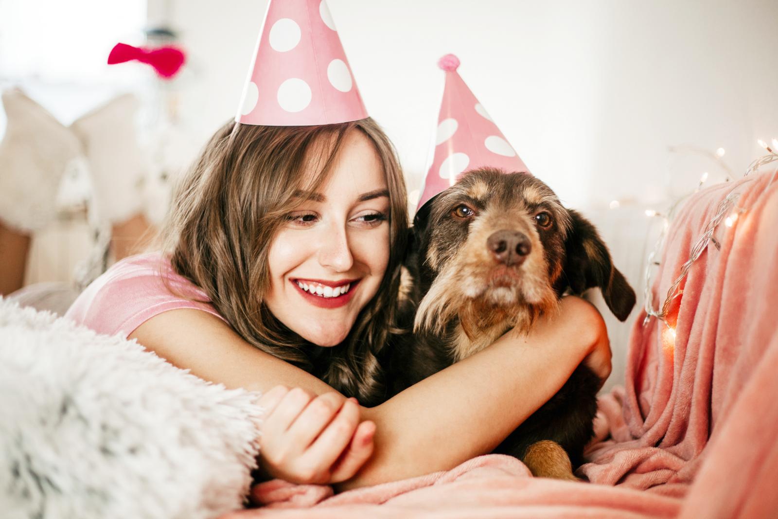 Girl celebrating her dog's birthday