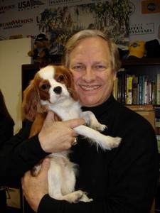 David Frei holding a puppy