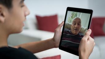 Using tablet for video call with family at home