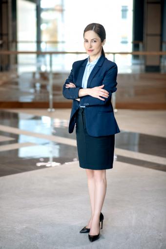 Woman wearing skirt and jacket