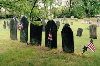 https://cf.ltkcdn.net/dying/images/slide/304639-850x566-flags-by-gravestones.jpg