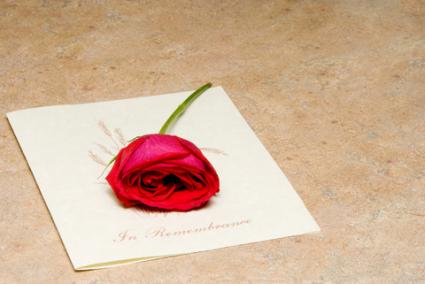 Funeral program for a loved one; copyright © Robert Byron at Dreamstime.com