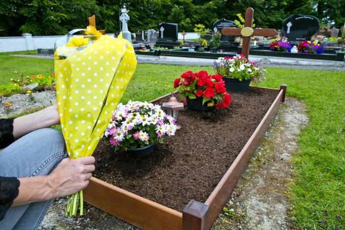 Mourner at a green burial site