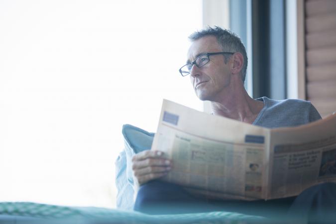 Man-reading-paper.jpg