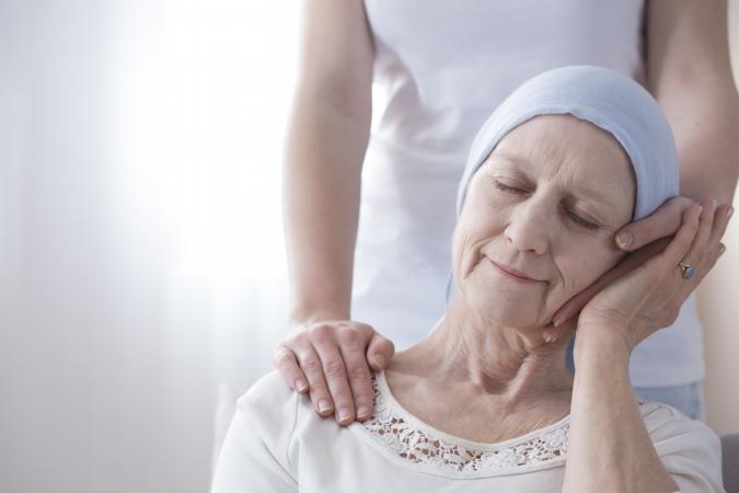Loved one comforting hospice family member
