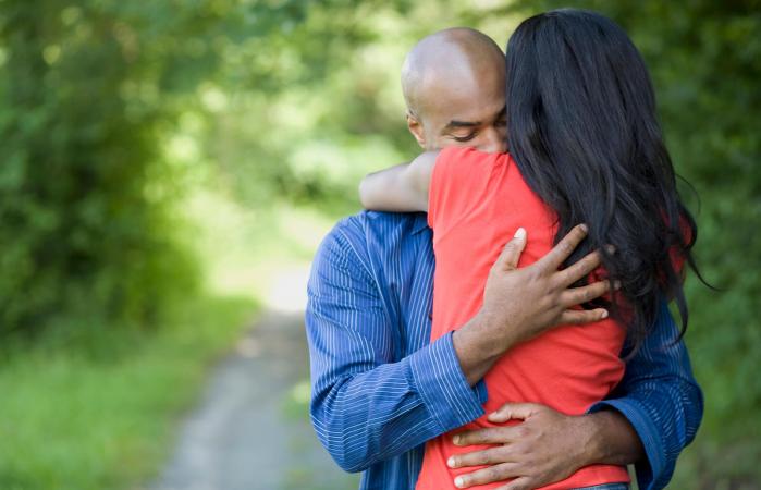 couple hugging outdoors