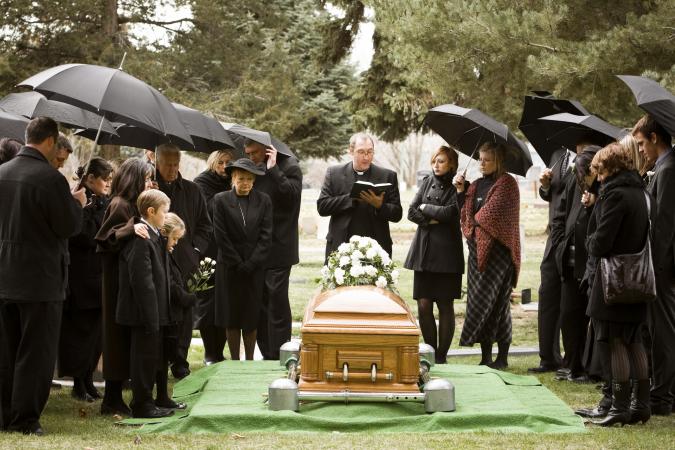 People attending a funeral