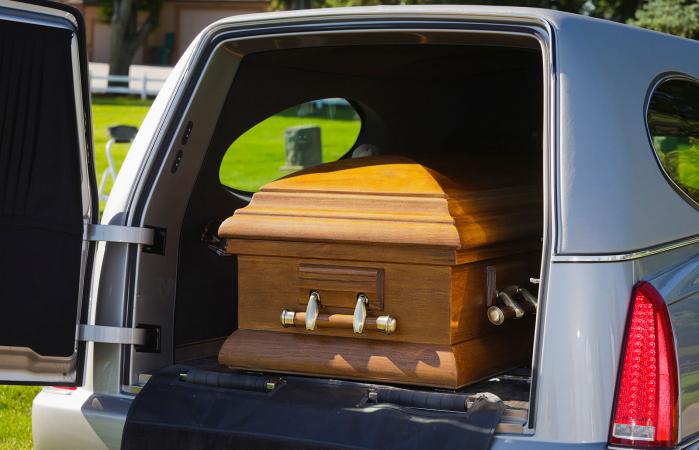 casket in an open hearse