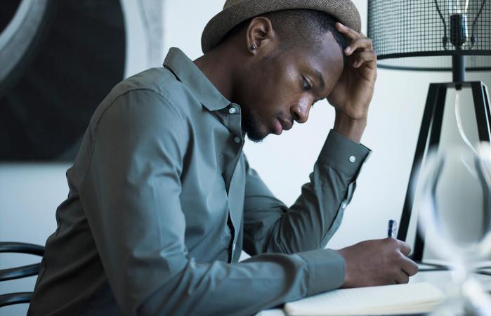 man working on a worksheet