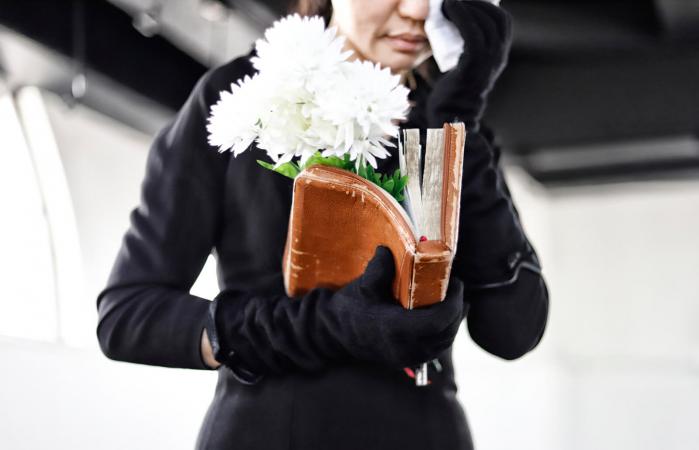 Bereaved mourning at funeral
