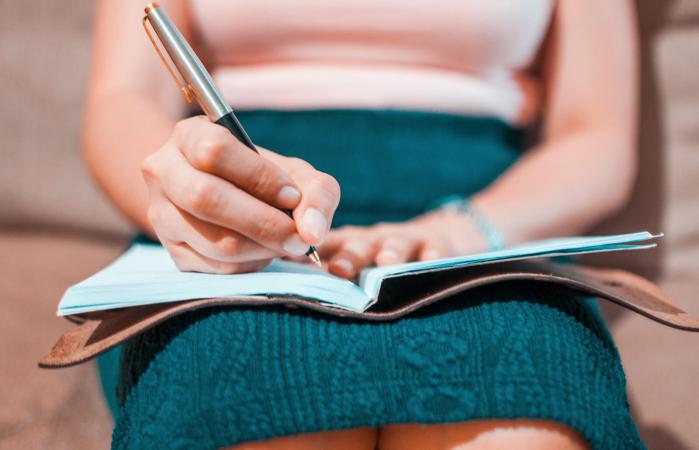 woman writing eulogy
